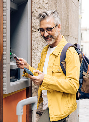 Man at an ATM machine